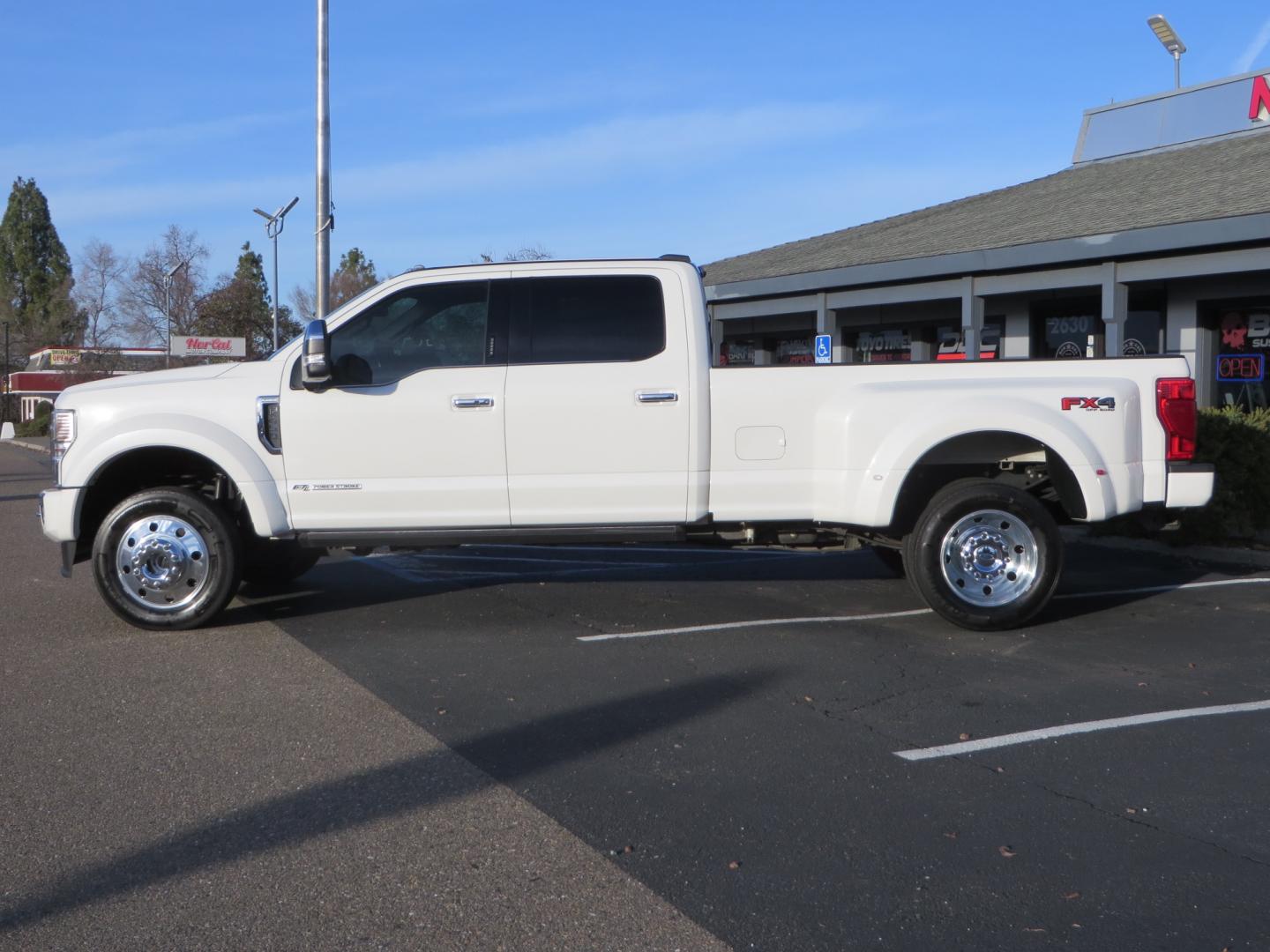 2020 White /BLACK Ford F-450 SD PlatinumCrew Cab DRW 4WD (1FT8W4DT4LE) with an 6.7L V8 OHV 16V DIESEL engine, 6A transmission, located at 2630 Grass Valley Highway, Auburn, CA, 95603, (530) 508-5100, 38.937893, -121.095482 - Must see F450 with a tool box refueling station, window tint, and a center console vault. - Photo#7